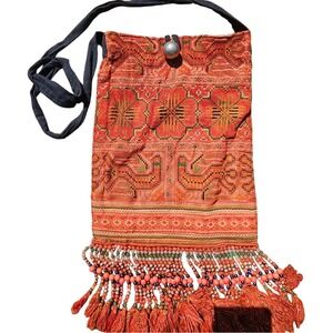 Comfy Bohemian Orange Floral Aztec Beaded Fringe Bag with button closure. Comfy